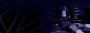 Developer typing as monitors display HTML code and a neon “HTML code language” icon on a dark blue background
